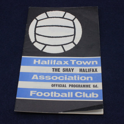 Vintage football club programme with Halifax Town logo on a dark background