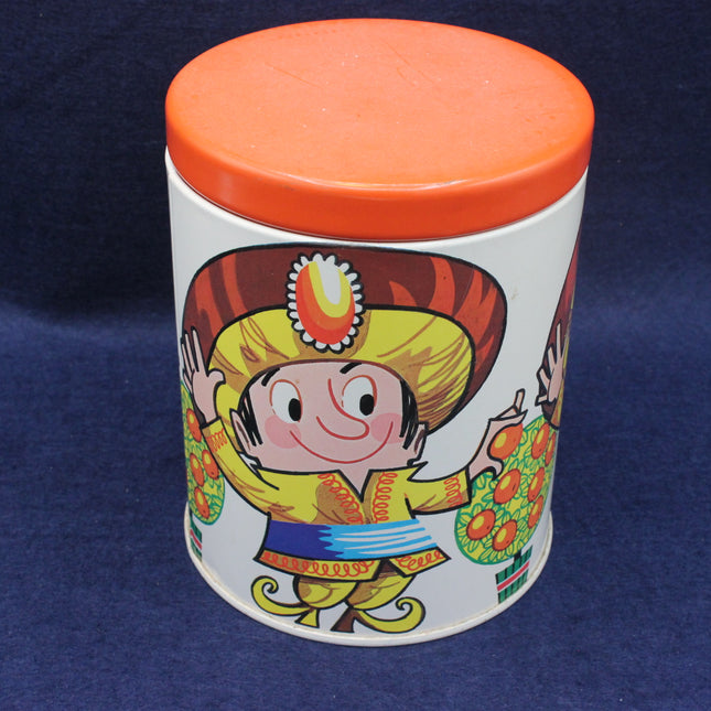 Decorative container with a colorful illustration of a Jaffa Cake character on an orange lid against a dark background