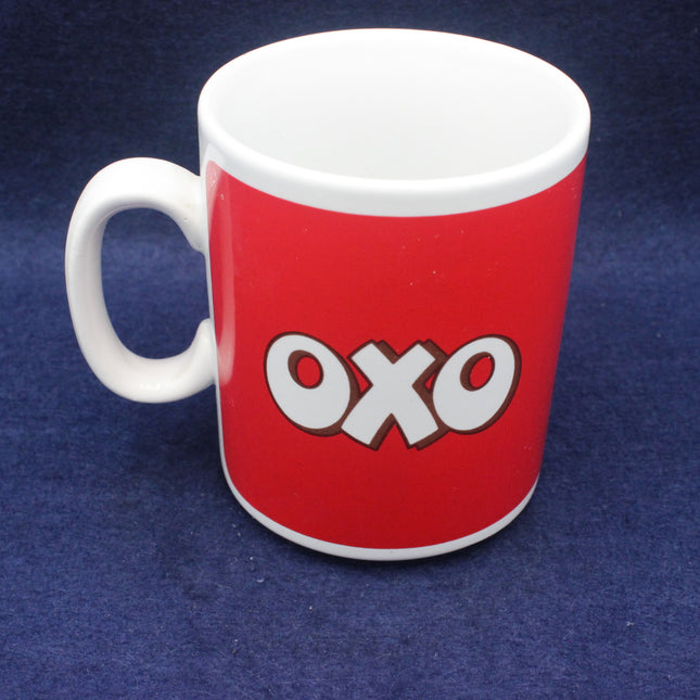 Red mug with 'OXO' logo on a blue background