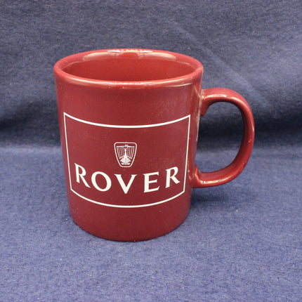 Red mug with 'Rover' logo on a blue background