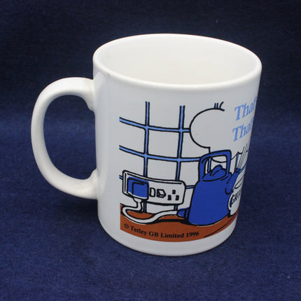 White Tetley Tea Folk mug with blue kettle design on a dark blue background