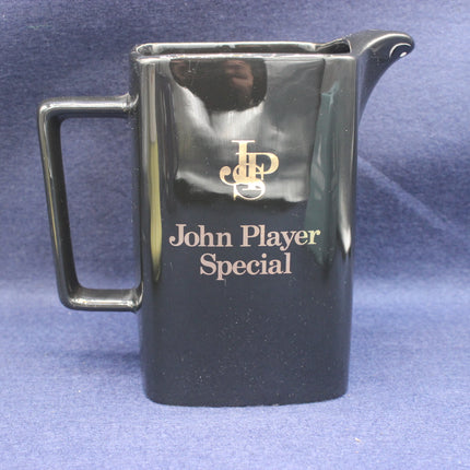 Black pitcher with 'John Player Special' branding on a blue background