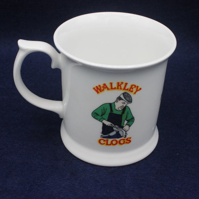 White mug with 'Walkley Clogs' logo on a dark blue background