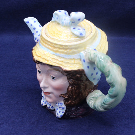Vintage Beswick “Dolly Varden” Teapot 1203  Dickens Characterware on a dark blue background