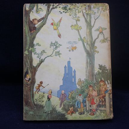 Vintage children's book cover with illustrations of children and a castle in a forest