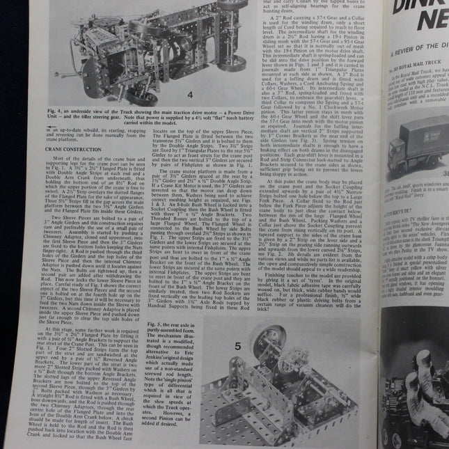 Open magazine with toy truck illustrations and text on a black background