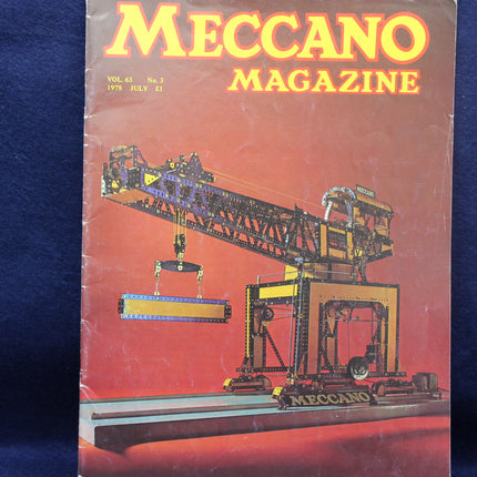 Meccano Magazine cover with a crane model on a red background
