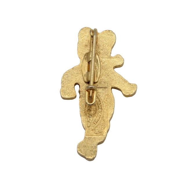 A small gold-colored metal charm or pendant with a textured, organic shape and a spring-ring clasp, shown on a plain light gray background.