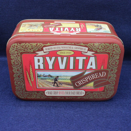 Ryvita Crispbread tin with decorative design on a blue background