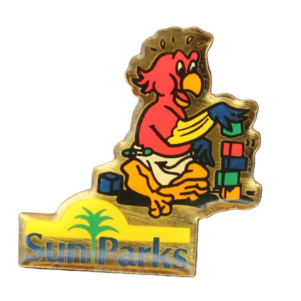 Pin with cartoon character Parrpt on a white textured background
