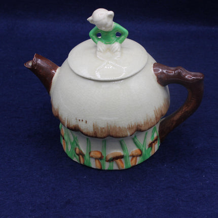 Vintage Suvesco crackle‑glaze mushroom cottage teapot with hand‑painted detail and whimsical charm. Classic British novelty pottery with strong collector appeal.