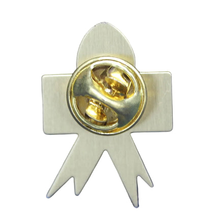Gold-colored badge with a central circular design on a blue textured background