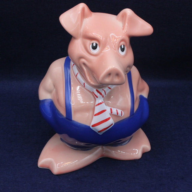 Piggy bank with a sailor outfit on a dark blue background