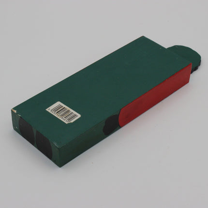 A rectangular green product box with a red side panel and a barcode label, photographed on a plain light gray background.