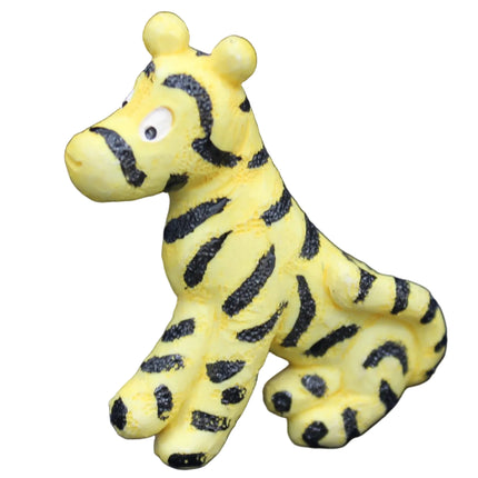 Yellow and black striped toy giraffe on a blue background