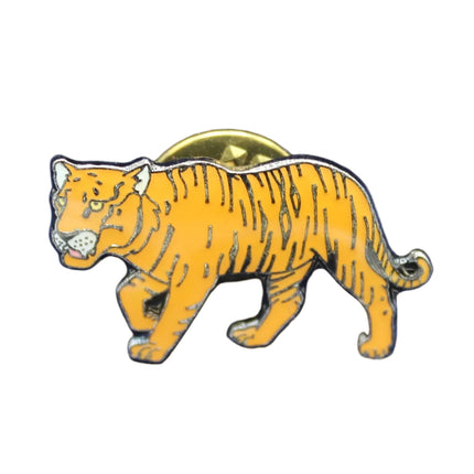 Yellow tiger pin on a blue textured background