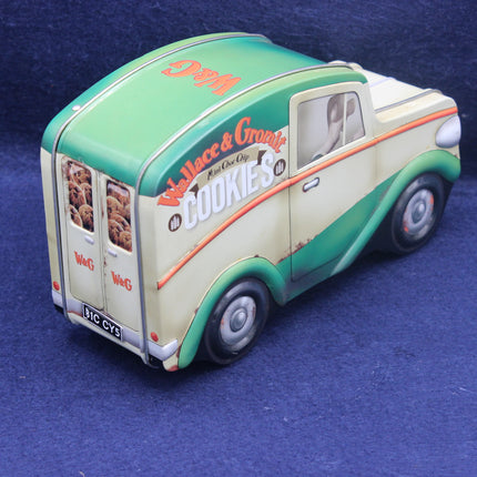 Model of a vintage van with 'Woolworths Cookies' branding on a blue background