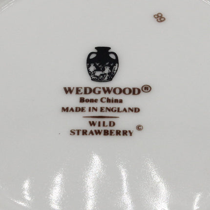 The bottom of a white Wedgwood Baso China ramekin, featuring the printed brand logo and 'Wild Strawberry' text on a clean white background.