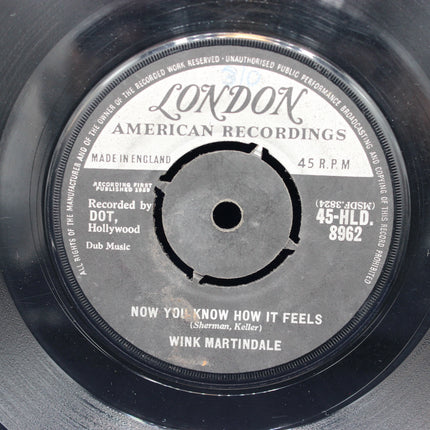 Record label with 'London American Recordings' and song details on a vinyl record.