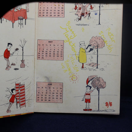 Illustrated calendar with cartoon characters and gardening scenes on a dark background