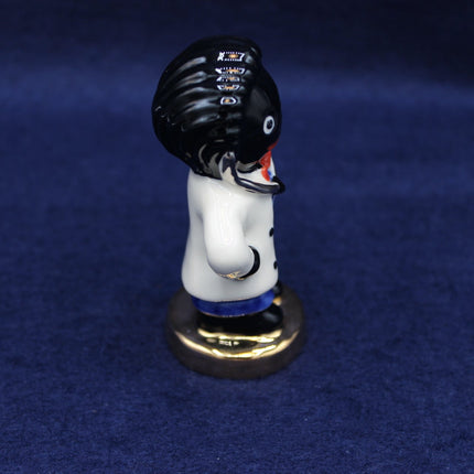 Golly Doctor Figurine Side View