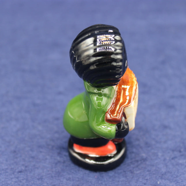 Side view Carltonware Series 2 Squeeze Box Golly figurine