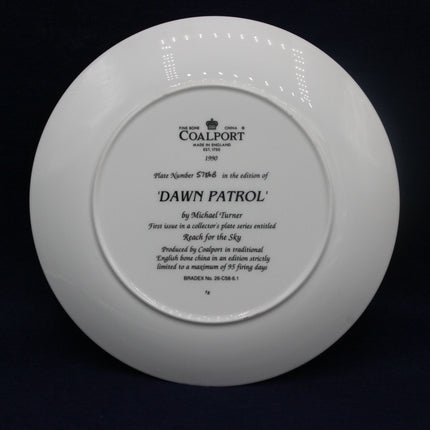 Coalport plate with engraved text on a black background
