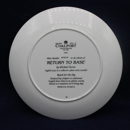 White Coalport plate with black text on a dark background