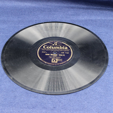 Vinyl record with a Columbia label on a blue surface