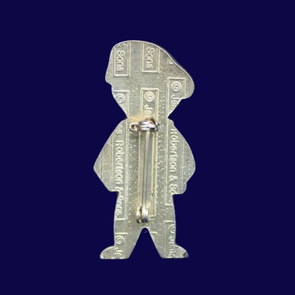 1994 James Robertson French Golly badge with bubble‑coat finish