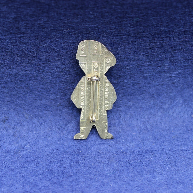 1994 James Robertson French Golly badge with bubble‑coat finish