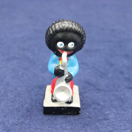 Small figurine of a Golly playing a sax