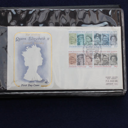 A collectible First Day Cover envelope for Queen Elizabeth II, sealed in a protective plastic sleeve and photographed against a dark blue background. The cover features a white background with a blue silhouette of the Queen, gold decorative borders, and a printed stamp sheet on the right side.