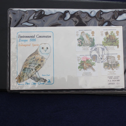 A 1986 Nature Conservation Europa Europe 1986 Endangered Species First Day Cover from Jersey, featuring a barn owl illustration and four postage stamps, shown inside a clear protective sleeve on a dark blue background.