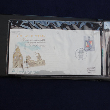 A commemorative Great Britain Commonwealth Metallurgy Conference envelope displayed in a clear protective sleeve on a dark blue background.