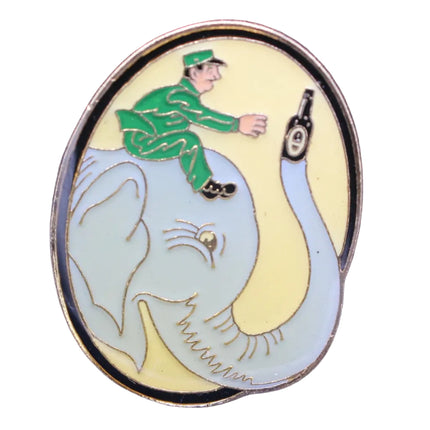 Guinness 1997 pin badge of an elephant and rider with a bottle of Guinness