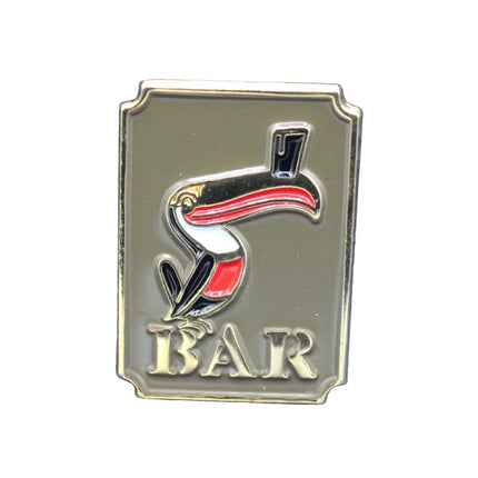 Metallic bar sign with a stylized duck design on a blue textured background