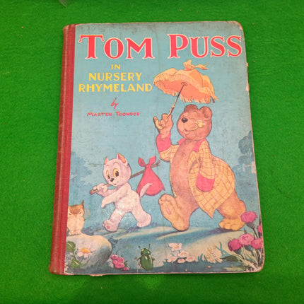 Tom Puss in Nursery Land Annual on a green background