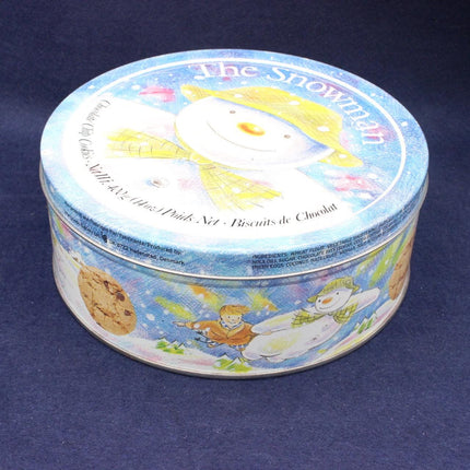 Round tin with 'The Snowman' illustration on a blue background