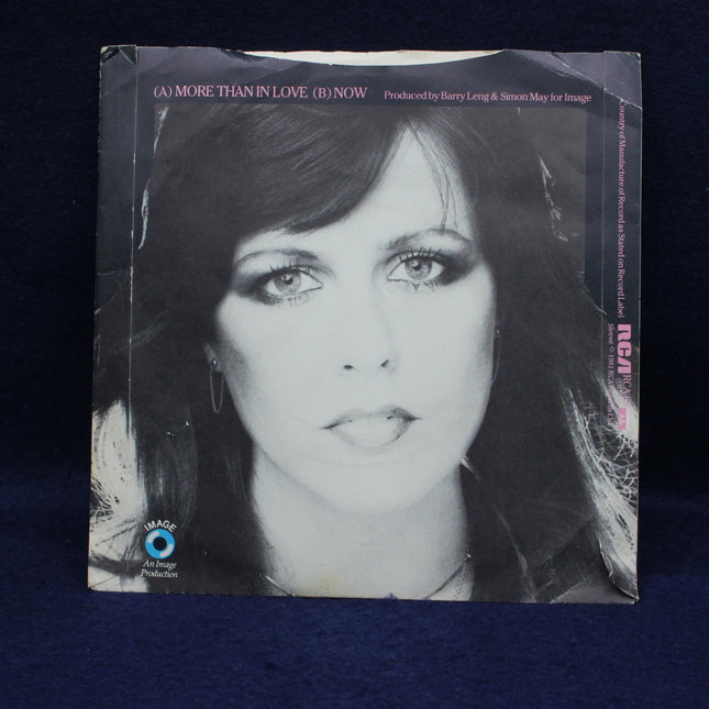 Album cover with a black and white portrait of a woman on a dark background