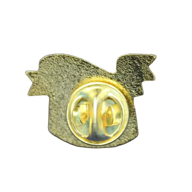Gold pin with a logo on a blue textured background