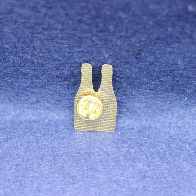 Rear clap of vintage Moet badge