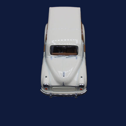 Model of a vintage car on a dark textured surface
