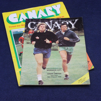 Two 'Canary' football magazines from 1979-80 on a blue background