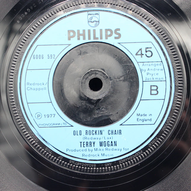 Close-up of a Philips 45 RPM record label with Old Rockin Chair text and Phillips branding.