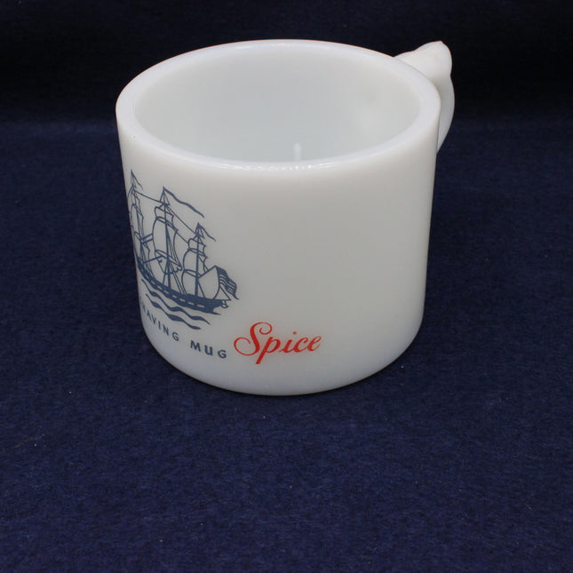 White mug with ship design and 'Spice' text on a dark blue background