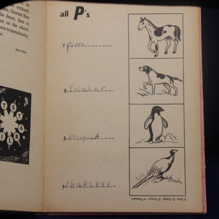 Open book with illustrations of animals and text on a dark background