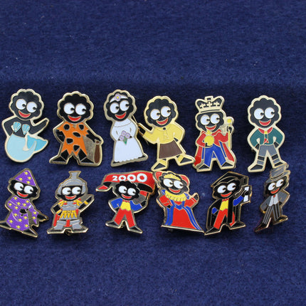 A full set of 12 Robertson's Golly Badges From 1999