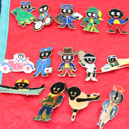 A set of colorful Robertsons Golly enamel lapel pins arranged on a bright red textured Golly badge scroll.