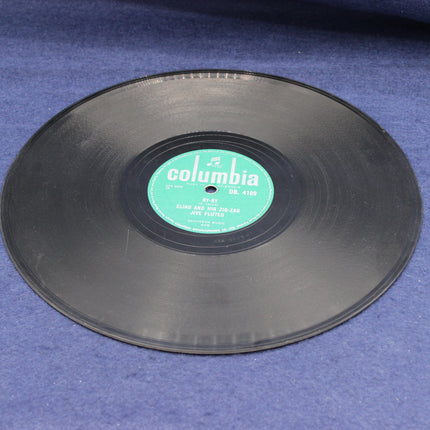 Shellac record with a Columbia label on a blue surface